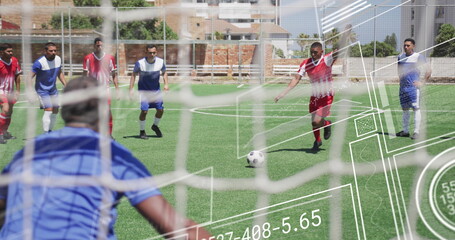 Aiming red-jerseyed striker preparing free-kick at urban soccer field, with soccer ball and netting