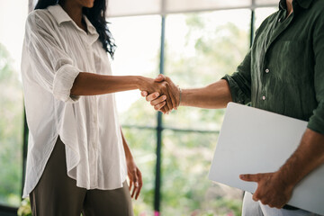Modern, inclusive, and collaborative atmosphere in the office. They warmly welcome the new colleague