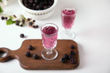 Blackberry alcohol liqueur on the table