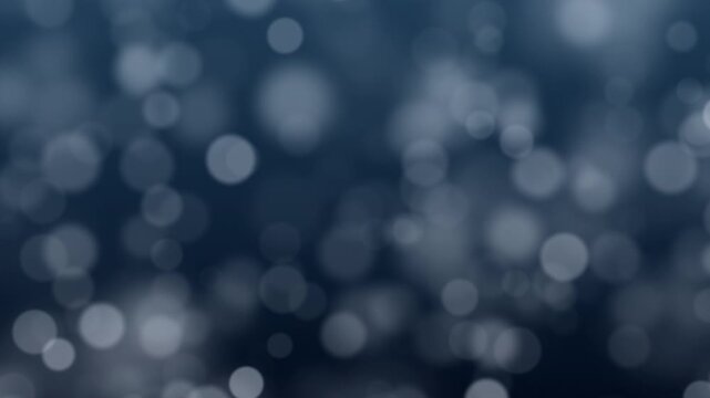 Abstract Blue Bokeh Particle Background,A seamless loop of soft,glowing bokeh particles gently floating against a dark blue background,calm,and atmospheric projects or as a subtle overlay