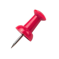 Single red push pin against a black background