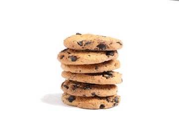 Stack of tasty chocolate chip cookies on white background
