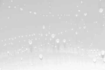 White water with ripples on the surface. Defocus blurred transparent white colored clear calm water surface texture with splashes and bubbles. Water waves with shining pattern texture background.