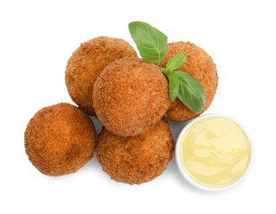 Delicious fried croquette balls, sauce and basil isolated on white, top view