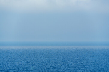 sea surface with small waves as background or texture, bright blue color