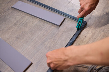The process of cutting vinyl flooring accurately is essential for achieving a perfect fit