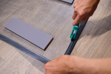 The process of cutting vinyl flooring accurately is essential for achieving a perfect fit