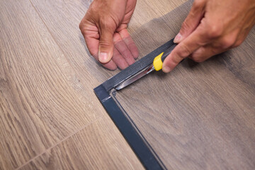 The process of cutting vinyl flooring accurately is essential for achieving a perfect fit