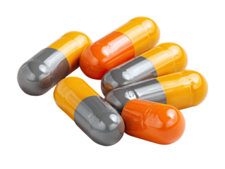Close-up view of several pills.  Two colors, orange and gray,  form  the capsules,  lying  in  a group.  Pharmaceutical