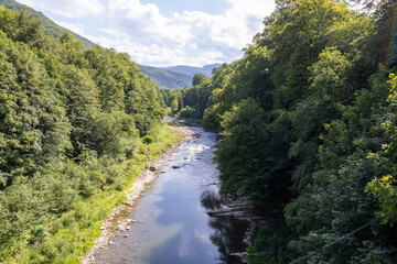 The Prut River is a major Carpathian river that flows through the popular resort town of Yaremche, known for its picturesque setting on the river's banks and the iconic Probiy Waterfall