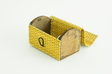 Wooden and bamboo chest on white background.