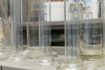 Close up detail of a scientist working with substances in a laboratory.