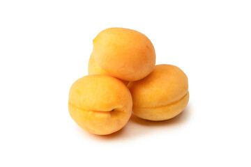 Ripe juicy orange apricots isolated on white background.