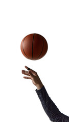 Male athlete throwing basketball mid-air with taped hand on white background. Concept of training...