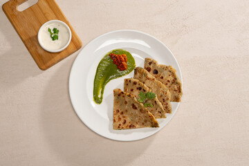 stuffed paratha with paneer, yogurt, pickles