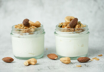 Close up of healthy food yogurt with muesli and granola.