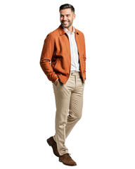 Naklejka premium portrait of a handsome young manwalking with hands in pockets 