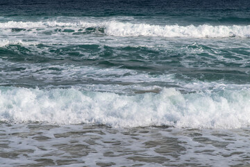 breaking waves on the sea in winter
