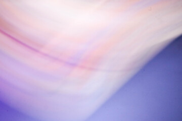 Abstract pink gradient background with flowing wavy stripes in pink yellow and white tones ideal for creative projects modern visuals and decorative design layouts