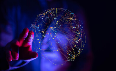 Hand interacting with a digital sphere, representing global network connections and data flow.