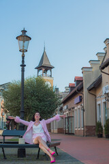 Obraz premium Urban Portrait of Mature European- Asian Woman in the City, spirit of modern femininity and maturity. A visual narrative about identity, independence, and timeless beauty 
