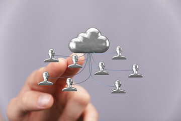Image depicts a cloud connected to multiple users, symbolizing secure data sharing and teamwork in cloud computing.