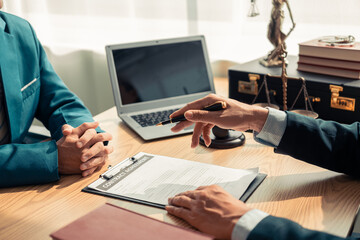 Professional lawyers and businessmen working and talking in law office. Legal concept. Judge's...