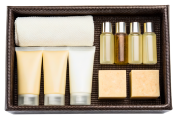 Set of hotel amenities and toiletries in a tray for guests isolated with transparent background