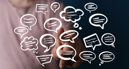 Hand interacting with digital speech bubbles,communication, dialogue, feedback concept.