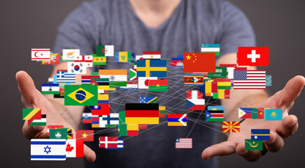 Image of many national flags interconnected, symbolizing global connections and international...
