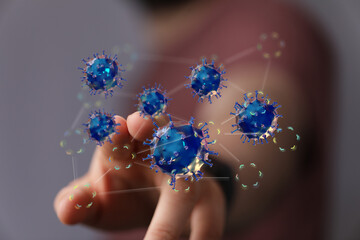 High-quality image of a hand interacting with a 3D model of viruses. Perfect for medical, science,...