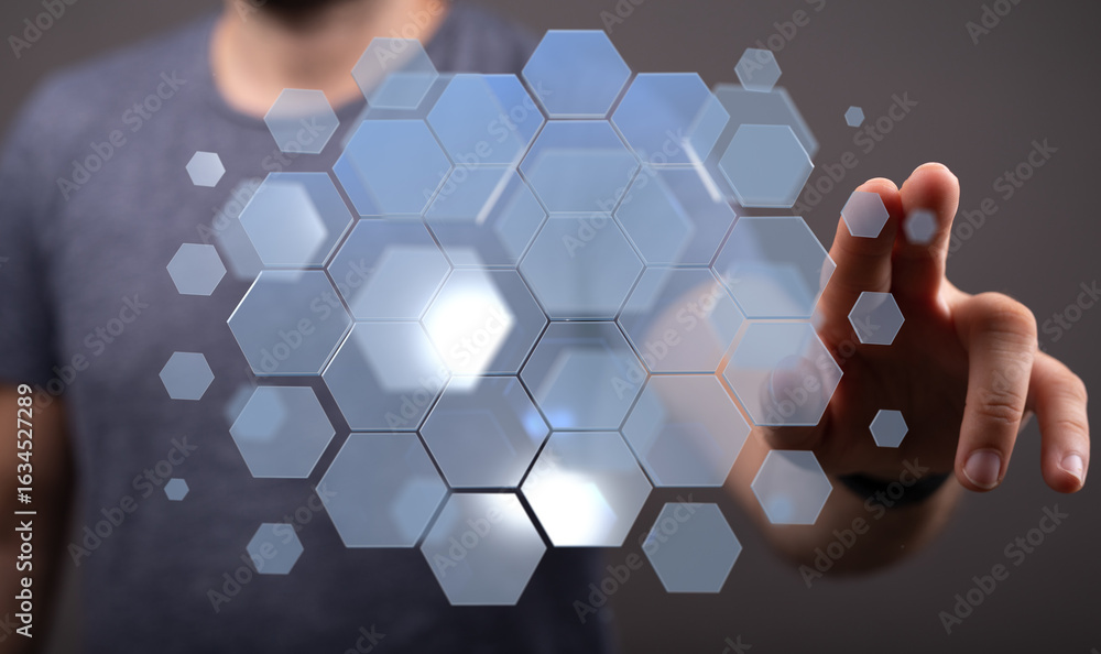 Poster person touching a digital interface with hexagonal elements. technology, innovation, future concept.