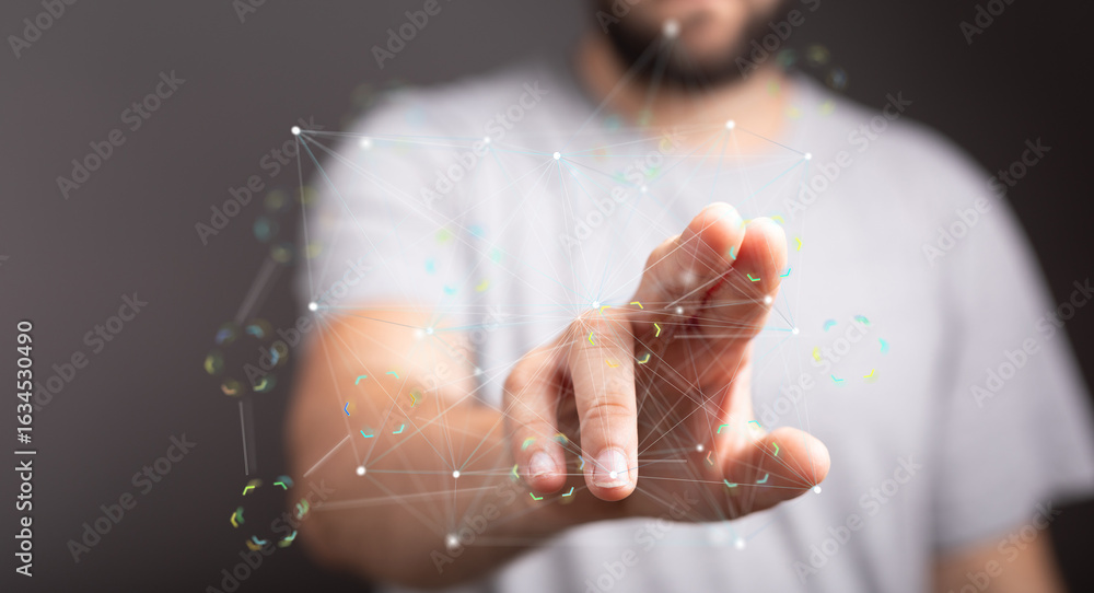Poster close-up of a man's hand interacting with a digital network visualization. modern technology concept