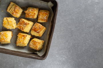 Freshly baked sesame puff pastry bites