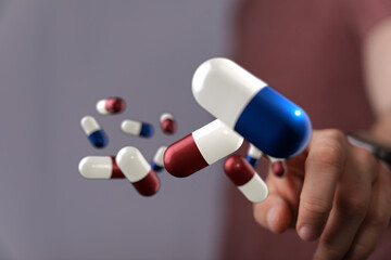 High-quality image of various medicine capsules. Perfect for healthcare, pharmaceutical, and...