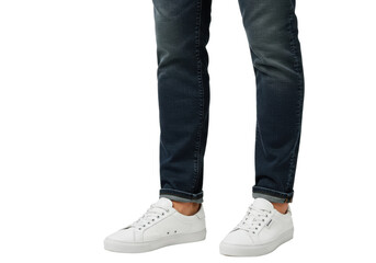 Casual male fashion: white sneakers and rolled-up jeans on young adult. Cut out PNG
