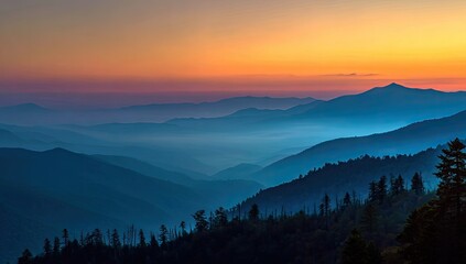 Majestic mountain range at sunset. Layers of peaks fade into a vibrant, colorful sky
