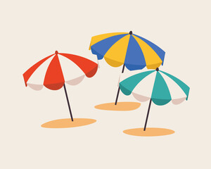 Obraz premium Colorful beach umbrellas providing shade on sandy shores
