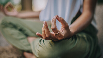 Mindful meditation with hand in gyan mudra outdoors, AI generated.