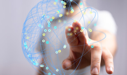 Person interacting with a digital network.  Conceptual image for technology, connectivity, and...