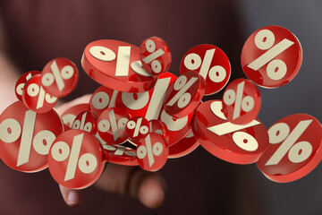 3D render of red percentage symbols floating above a hand. Ideal for sale, discount, or finance...