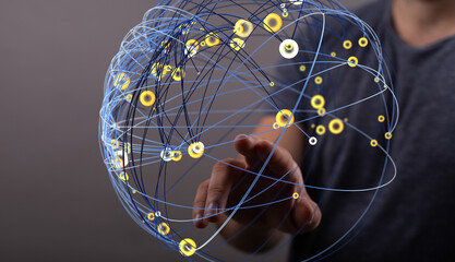 Person interacting with a digital network, showcasing global connectivity and data flow.