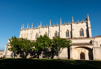 The Isabelline Gothic Monastery of Cartuja de Miraflores in Burgos, Spain, on a sunny day.