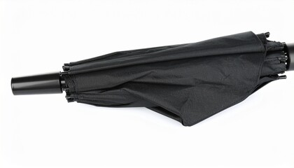 Closed black umbrella on a white background—symbolizing preparedness, concealment, and the quiet choreography of protection.