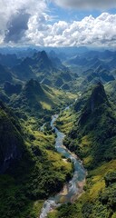 Obraz premium Lush valley winding through jagged peaks