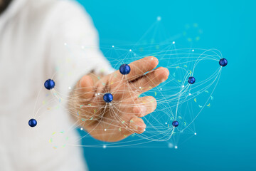 Image of a hand interacting with a digital network, representing global connection and technology.