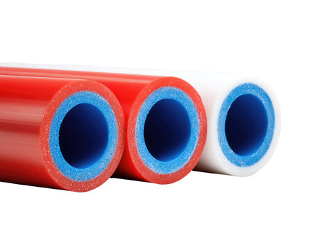 Three cylindrical tubes, red and white, with a blue inner layer.  Close-up view, highlighting the distinct color sections