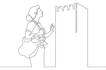 Continuous one line drawing woman chooses food products in a store.One continuous line isolated minimal illustration.Not AI.