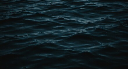 Mysterious Deep Blue Water with Subtle, Reflective Ripples