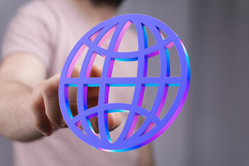Person interacts with a vibrant 3D globe, symbolizing internet connectivity and global reach.